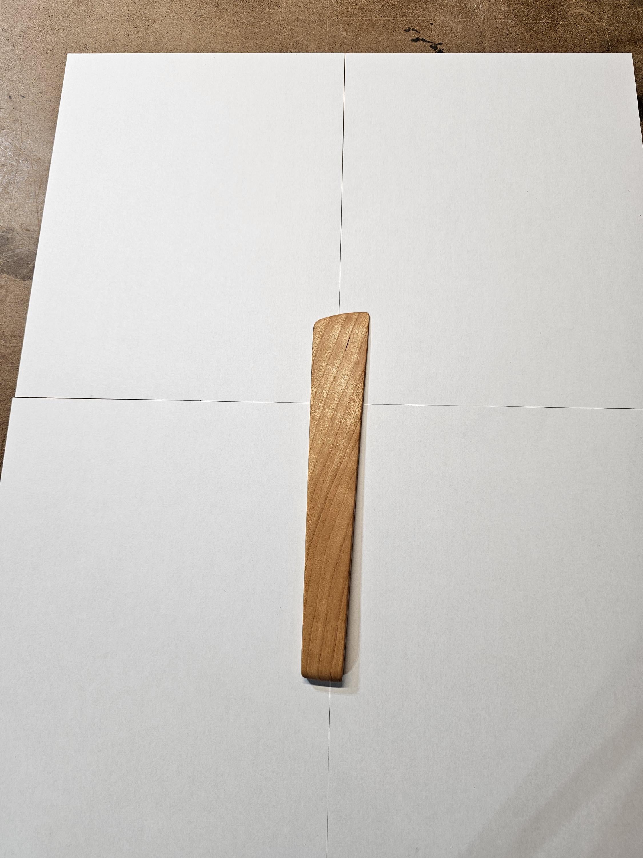 basic wooden stirring spatula on white background
